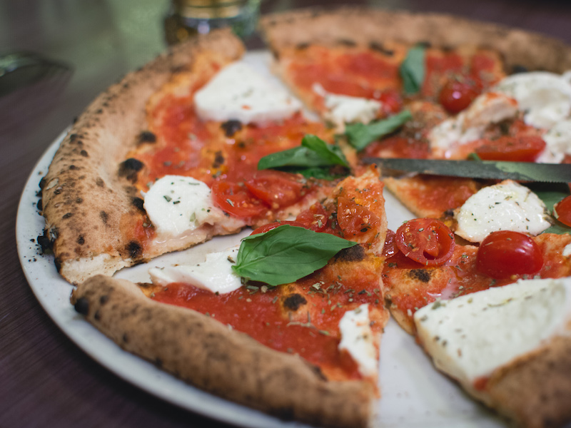 Simple italian pizza with cherry tomatioes